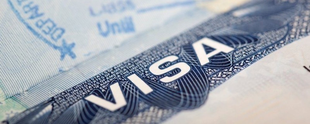 Будет ли НДФЛ, если организация оплатит физлицу билет и визу?
